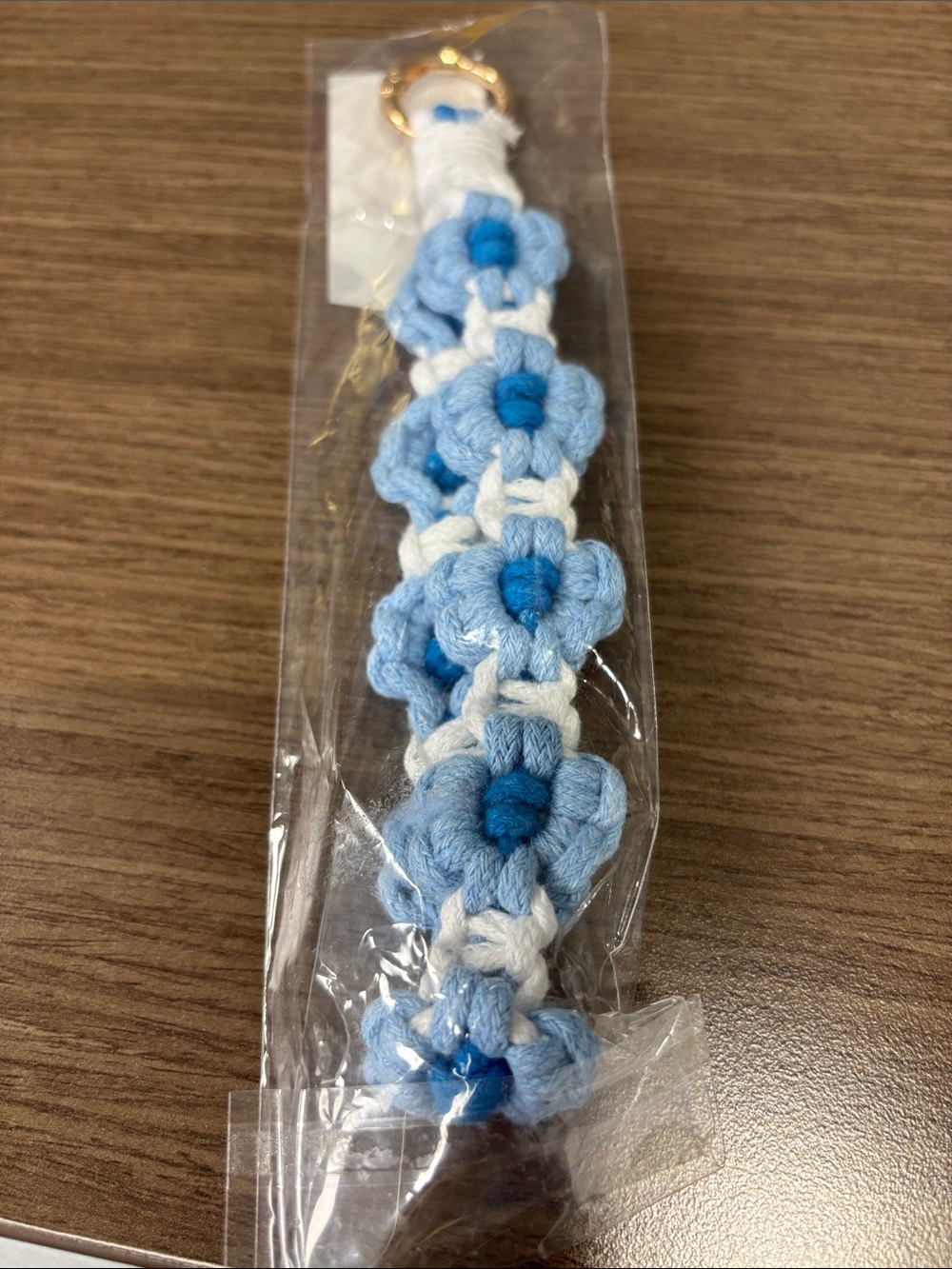 DD Designs Blue & White Floral Knit Phone Wristlet Strap.